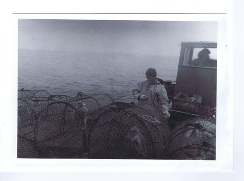 1972 - Sandy Finlayson (Priffy) and Ian MacKenzie launching creels onboard The Viking