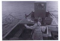 1972 – Sandy Finlayson (Priffy) and Ian MacKenzie launching creels onboard The Viking