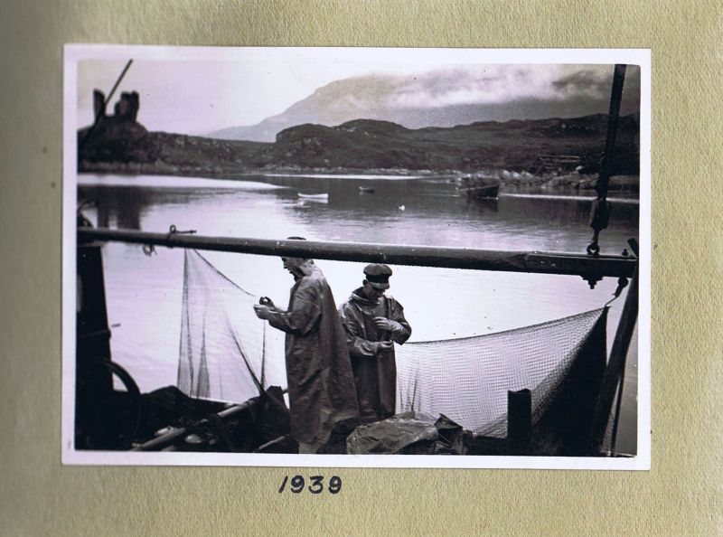 1939 - MFR Acacia. Donald Reid (on the left), note gbhlaghn net drying framework in background