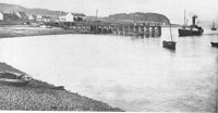 Circa 1900 - The wooden pier and Kyleakin beach, and probably the ship "Glencoe" approaching the pier