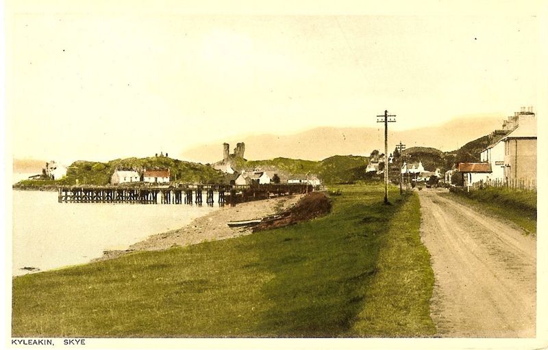 Circa 1930. The main road showing the wooden pier and the Kings Arms Hotel.