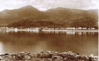 Circa 1938.
View from mainland with first council houses and new village hall (wooden pier still there). Village Hall (2nd right from the Kings Arms)
