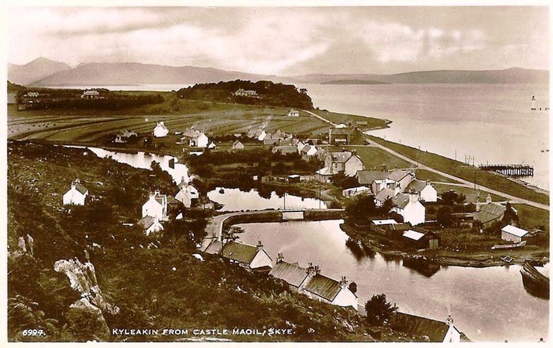 Circa late 1930's. View of village from Cnoc na Errich at high tide with "lots" in the background.