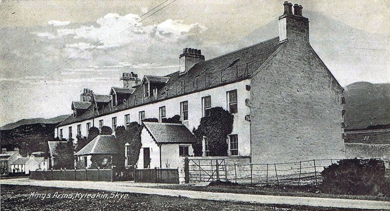 Circa late 1920's. Kyleakin Hotel and Kings Arms Hotel with the stables behind.
