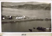 Down the Pier, showing the Coal Shed attached to the Tea Room and Shop. MacLean the Butcher’s shop is behind the coal shed. 
