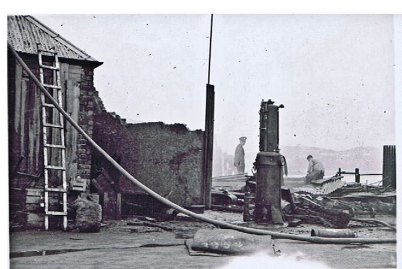 Around ferry office area following a fire in the 1930's. Circa 1930. Kyleakin from Castle Moil.