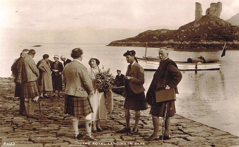 12th September 1933
Duke and Duchess of York later to become King George VI and Queen Elizabeth landing at Kyleakin.
In attendance were Lady Helen Graham and Lady Hermoine Cameron, Lord Alistair MacDonald (with stick and plaid) on his left is Dr Hector MacLean the parish minister.   
Major A D MacKinnon, Dunringell was also meeting them.
Note the Kyle/Kyleakin ferry launch - the 