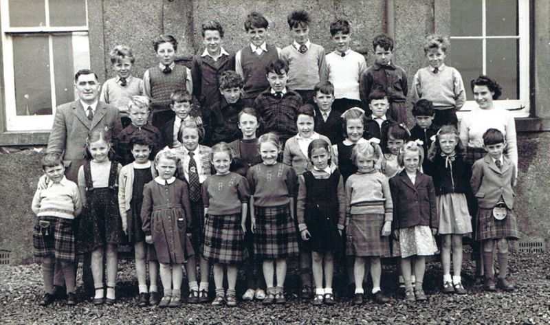 Kyleakin Public School 1950 - Headmaster Malcolm Gillies - Teacher Johan Montgomery
Back row: Howard Grigor, Harvey Grigor, Jimmy Urquhart, Lachie Robertson, Billy MacKay, Leslie MacColl, Donald John Maclaine, Hilton Grigor
Second row: Bruce Dargavel, Hector Grant, Stanley Robertson, John Ross, John MacRae, Ian MacRae, Donald Robertson
Third row: William MacRae, Theresa Donnachie, Pamela Smith, Mary Ellen MacIntosh, Nancy Iley, Mary Ross, Patricia Lang, Anna Belle Robertson, Katherine Barrie, Norman Fraser
Front row: Ann Graham, Joan MacPherson, Mary MacPherson, Margaret MacLaine, Ann Grant, Marie MacPherson.