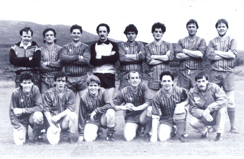 1988 ish - Kyleakin Football Team at Kyleakin Football Pitch
Back row left to right:  William MacKinnon, Michael Taylor, John MacLeod, John Robertson, Ronald Reid, Peter Robertson, Alasdair Morrison and John Reid
Kneeling, left to right:  Donald MacLeod, Malcolm Reid, John Houston, Christopher MacKinnon, Paul Flynn (Glasgow) and John Finlayson