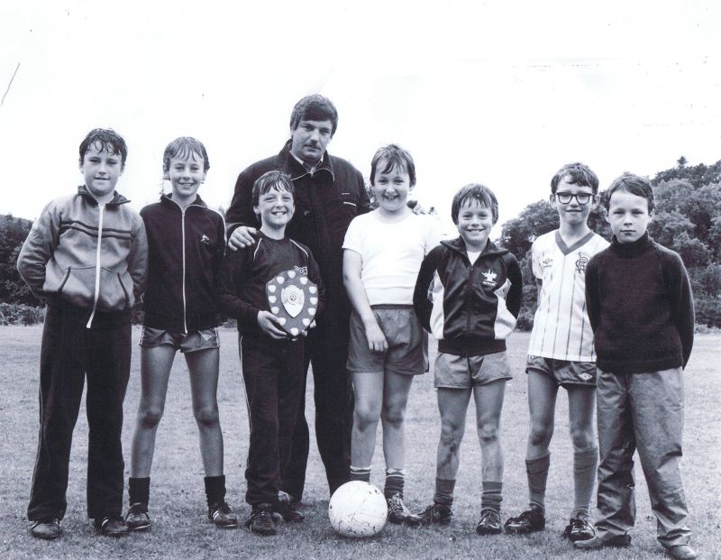 Circa 1982 - Kyleakin Junior Football Team Left to right:  Norman Robertson, Finlay Morrison, Joseph Maguire, Alex Dan MacDonald (Coach), David MacLennan, Derek MacDonald, Alan Grant and John Pearson