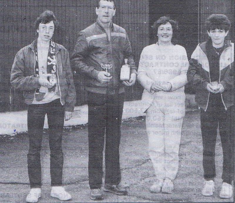 Trophy winners from the recent New Year "fun runs" from Broadford and Ashaig to Kyleakin - 4th Jan 1986.
Left to Right: Calum Jack (Dornie), winner of the junior event; senior winner Gordon Jeffrey (Ardvasar); Catherine Grant (Kyleakin), the only adult lady to brave the elements; and Caroline MacPherson (Kyleakin), first junior girl home.